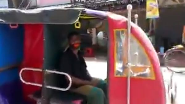 സാമൂഹിക അകലത്തിന് നൂതന ആശയവുമായി ഇ-റിക്ഷ ഡ്രൈവർ; വീഡിയോ വൈറൽ