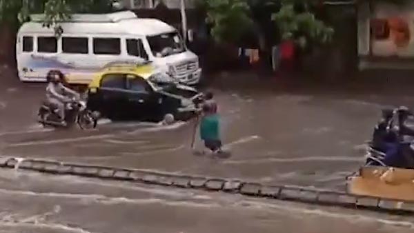 മഴയത്ത് മാൻഹോളിന് കാവൽ നിന്ന കാന്തയാണ് താരം